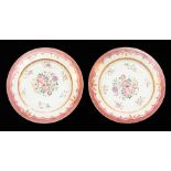 A pair of Chinese plates, Qianlong, famille rose decoration of floral sprays and ribbons within a