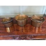 Six various graduated antique brass jam pans with iron bale handles, largest 31cm diameter (6)