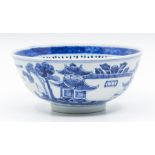 A Chinese blue and white bowl, Kangxi mark but late 19th or early 20th Century, decorated with