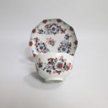 A Rare Liverpool  cleft shaped Tea Bowl and Saucer, painted in over glaze red and under glaze blue