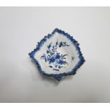 A Derby Leaf Shaped Pickle Dish with a pierced Stalk painted with flowers under a feather edge