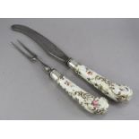 Two late eighteenth century porcelain, hand-painted pistol grip cutlery items to include a knife and