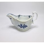 A Liverpool Blue and White Sauce Boat with a moulded body painted with flowers Date circa 1775