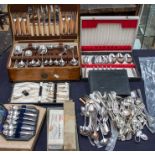 A collection of silver plated items including mostly flat wares, oak cased cutlery set, 19th and