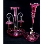 Two late 19th Century ruby glass table decorations/posy vases