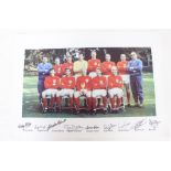 A signed World Cup 1966 Winners photograph, signed by Nobby Stiles, Jack Charlton, George Cohen, Ray