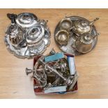 Two silver plated tea sets on trays, early 20th Century, along with a collection of silver plated