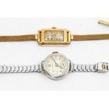 An Art Deco 9ct gold watch, rectangular dial with Arabic markers, case approx 13 x 25mm, on a rolled