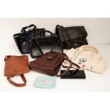 A box of assorted hand bags including leather Radley handbags and purses, Jones Bootmaker leather