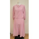 A collection of ladies vintage clothing to include a 1940's rabbit fur cape with pocket, a pink