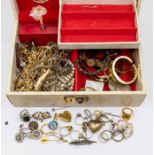 A collection of costume jewellery to include a silver and enamel pea pod brooch, paste set brooches,