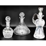 A collection of assorted glassware to include cut glass decanters and other various items. (two