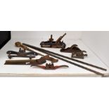 A collection of vintage tools to include: Saw by Groves & Sons Sheffield,; two record Shafter plans,