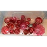 A collection of mid 20th Century ruby glass wares including jugs, vases, dishes, bowls etc