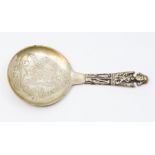 A Victorian silver spoon engraved with Norse King & Queen holding two children, by Jacob Tostrup,