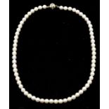 A single strand cultured pearl and 14ct gold diamond set necklace, white with pink overtone, each