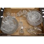 A collection of crystal and cut glass wares, including bowls and spirit glasses