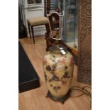 A large contemporary tale lamp with brass mounts, approx 60cm high excluding shade.