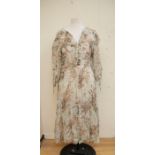 A collection of ladies vintage clothing of include a 1950's lined voile dress, rolled edge frills