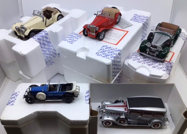Franklin Mint: A collection of Franklin Mint diecast vehicles to include 1948 MGTC, 1938 Jaguar
