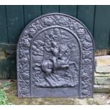 A 19th cent cast iron fire back