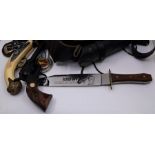 A Bowie knife, Cap gun , belts , spurs and similar items