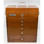 A vintage Dentistry Medical cabinet, circa 1960/70s the top opens to reveal section above six