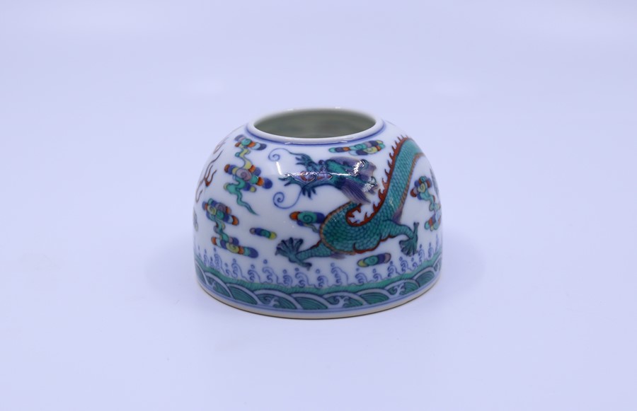 A Chinese porcelain  Doucai brush pot  bearing Qianlong mark to base