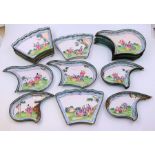 A set of 18 Chinese enamel serving dishes , quatrefoil shape