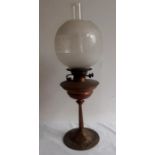An early 20th cent copper Art Nouvau oil lamp with oriiginal etched glass globe  Good condition no