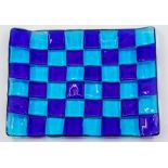 An Italian Murano blue glass chequer board serving plate, signed to reverse  Provenance  Baroness