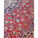 A large 20th cent Tabriz with red ground. 293 x 395 cm