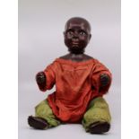An unusual early 20th Indian Wax doll possibly a shop display for Tea