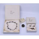 A modern Danish silver design necklace, brooch earring set, original Liberty boxes, Stamped Sterling