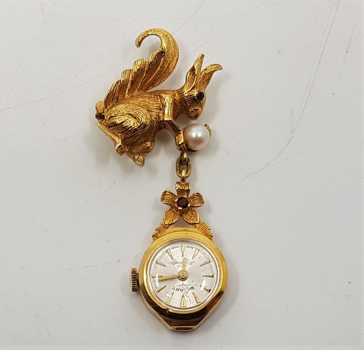 A 9ct. gold, cultured pearl and garnet set "squirrel" nurses fob watch, the squirrel brooch