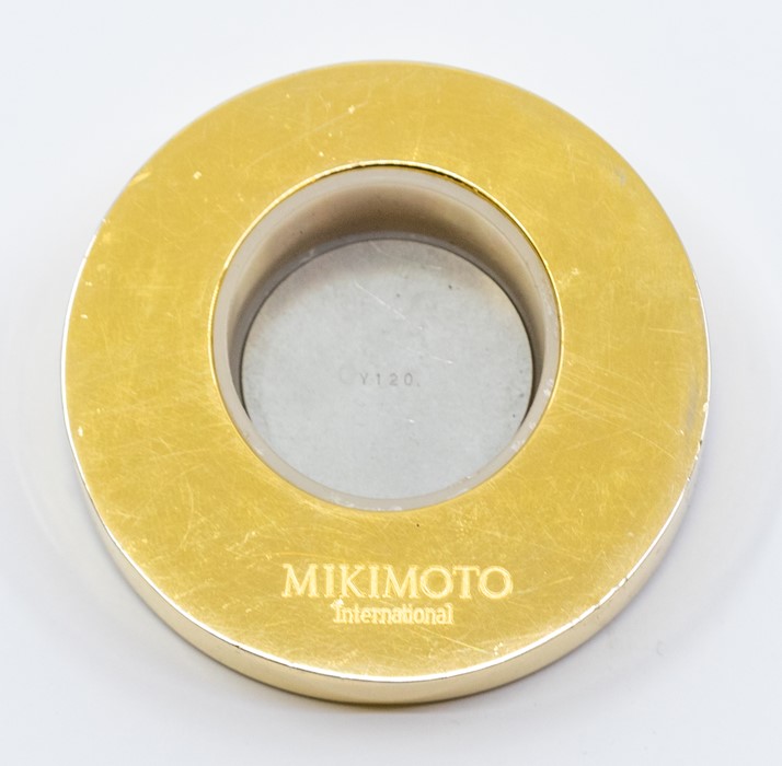 A Mikimoto International travel clock, comprising a gold tone round dial, with number markers, - Image 2 of 3