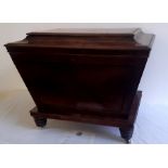 An early 19th century mahogany wine cooler complete with original sales invoice from 1973 from
