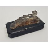 A Chinese Qing dynasty carved crystal reclining Guanyin paperweight, length 11.3cm.