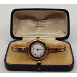 A 9ct. gold ladies' bracelet watch, manual wind, having white enamel Arabic numeral dial, 27mm