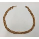 A 9ct. gold four strand choker necklace, formed from four graduated oval link chains, length 40.5cm.
