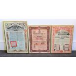 Two framed Chinese Share certificates and a further share certificate