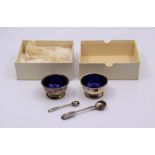 A pair of silver eggcups boxed