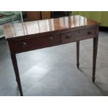 A Georgian style hallway table, with two draws, supported on tapered legs Provenance  Baroness