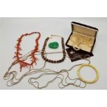A collection of costume jewellery, to include: a Christian Dior two tone four strand necklace,