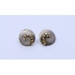 A pair of White gold  diamond encrusted modern design earrings