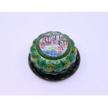 A Chinese Qing dynasty green ground box and cover with small plate
