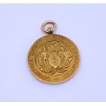 A 9ct gold Liverpool County Football Association medal