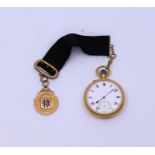 An early 20th cent Gold watch with 9ct gold fob awarded to the winner of the 100 Yards