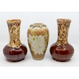 A pair of Melba Ware bottle vases, drip glazed necks to red/brown glazed body, one inscribed '