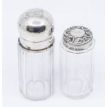 A Victorian glass jar with plain silver cover engraved with monogram, London, 1893, dents to